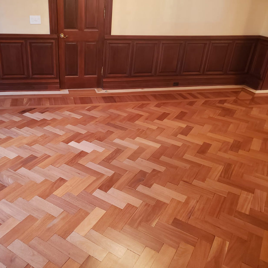  brown hardwood floor finished with pattern